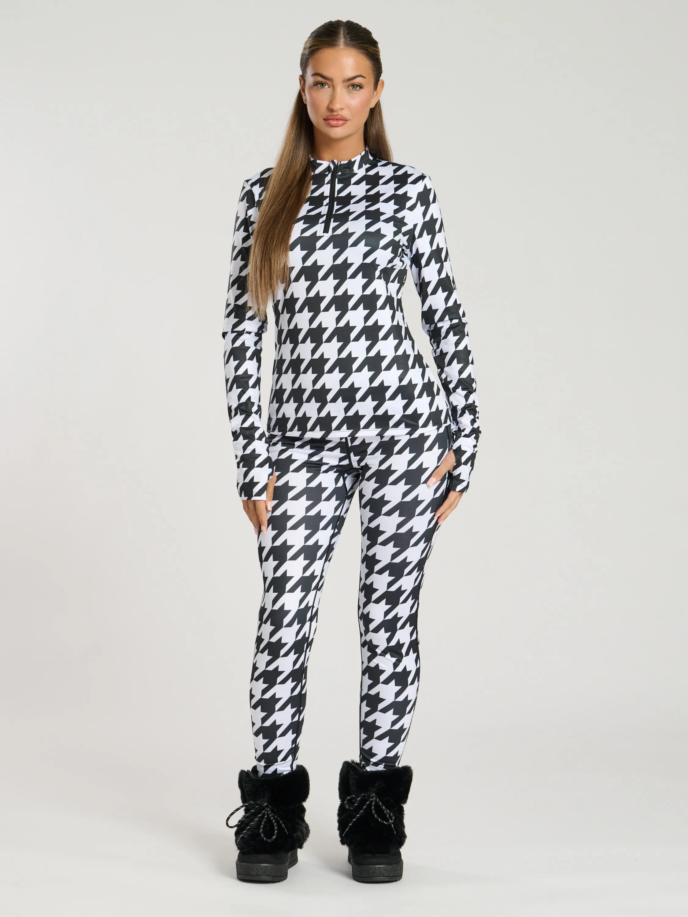 The 'Alps' half zip base layer in monochrome houndstooth